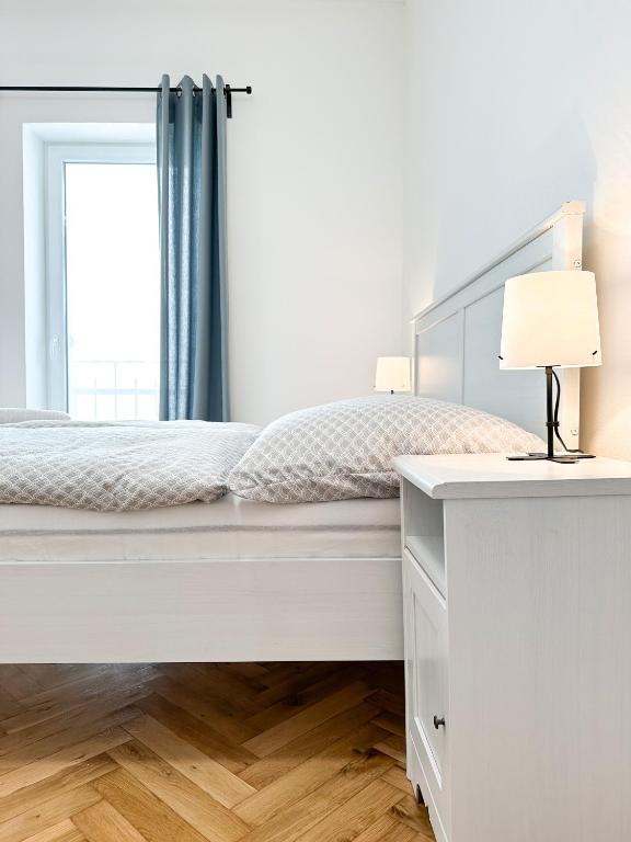 Postel nebo postele na pokoji v ubytování Jen tak spolu - apartmán Znojmo