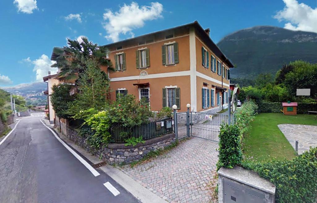 a large house on the side of a road at Casa Vacanze Agnello in Grandola ed Uniti