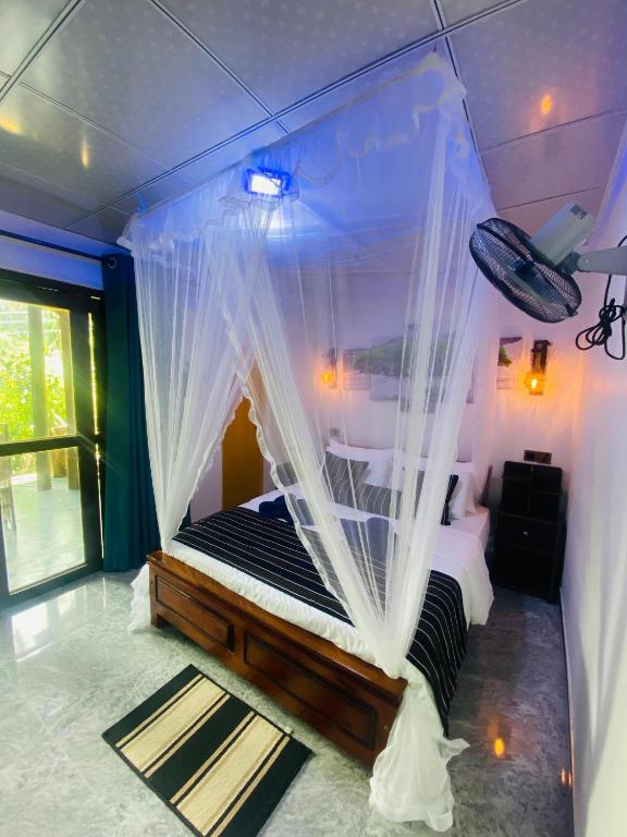 Postel nebo postele na pokoji v ubytování Treetops ella