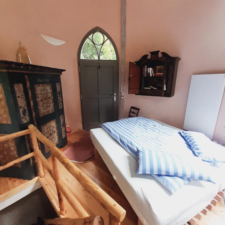 Postel nebo postele na pokoji v ubytování Rapunzel trifft Dornröschen