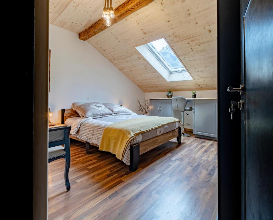 Postel nebo postele na pokoji v ubytování B&B Restaurant Le Pernollet