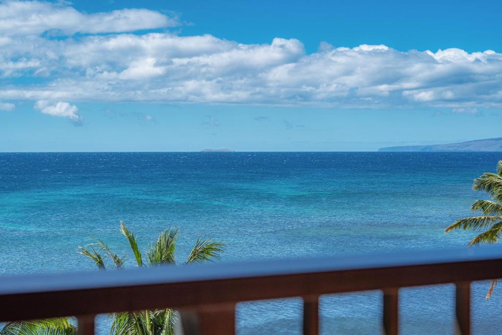 a view of the ocean from a balcony at 401 Maalaea Banyans in Wailuku
