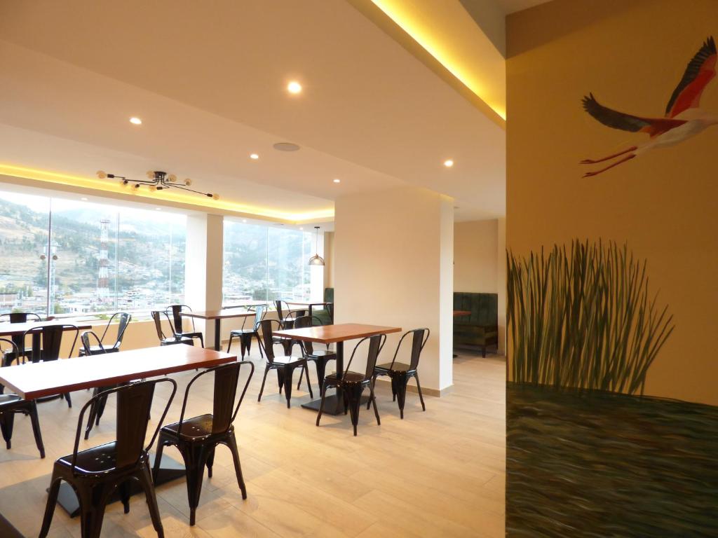 Ein Restaurant oder anderes Speiselokal in der Unterkunft Muña Hotel Andahuaylas 
