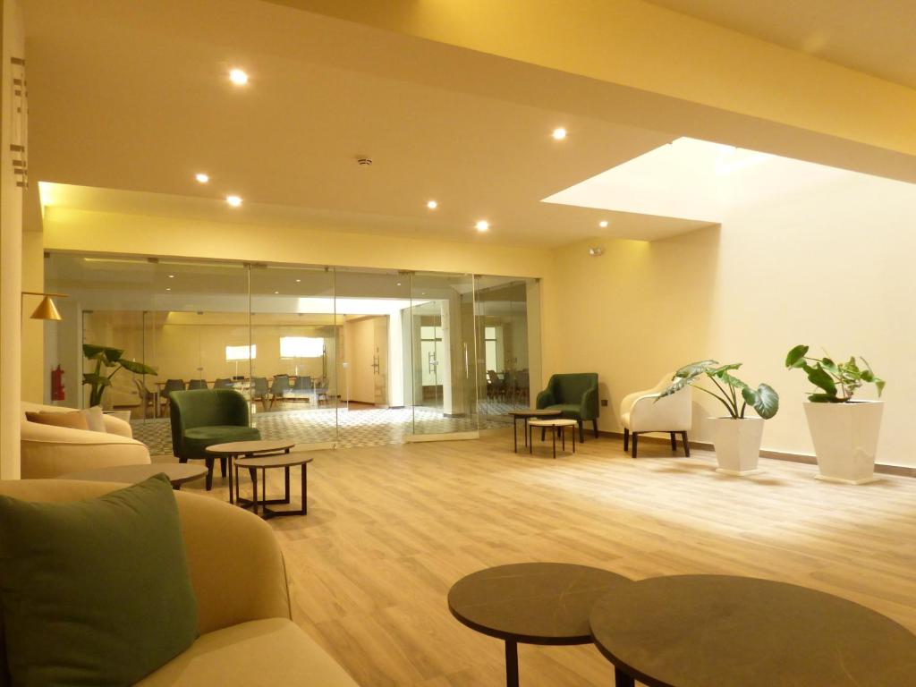 Ein Sitzbereich in der Unterkunft Muña Hotel Andahuaylas