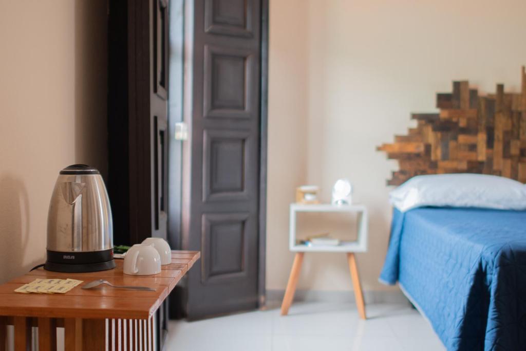 Postel nebo postele na pokoji v ubytování Hostal Encounter Guanajuato