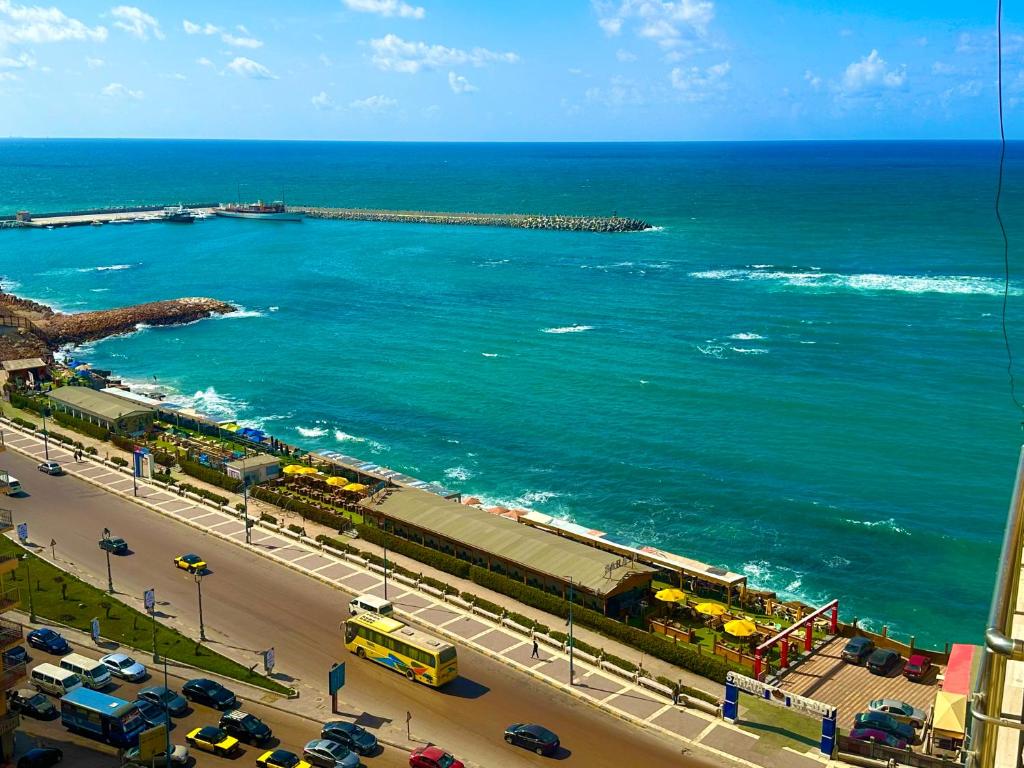 an aerial view of a city with the ocean at Apartment Sedi Beshr in Alexandria