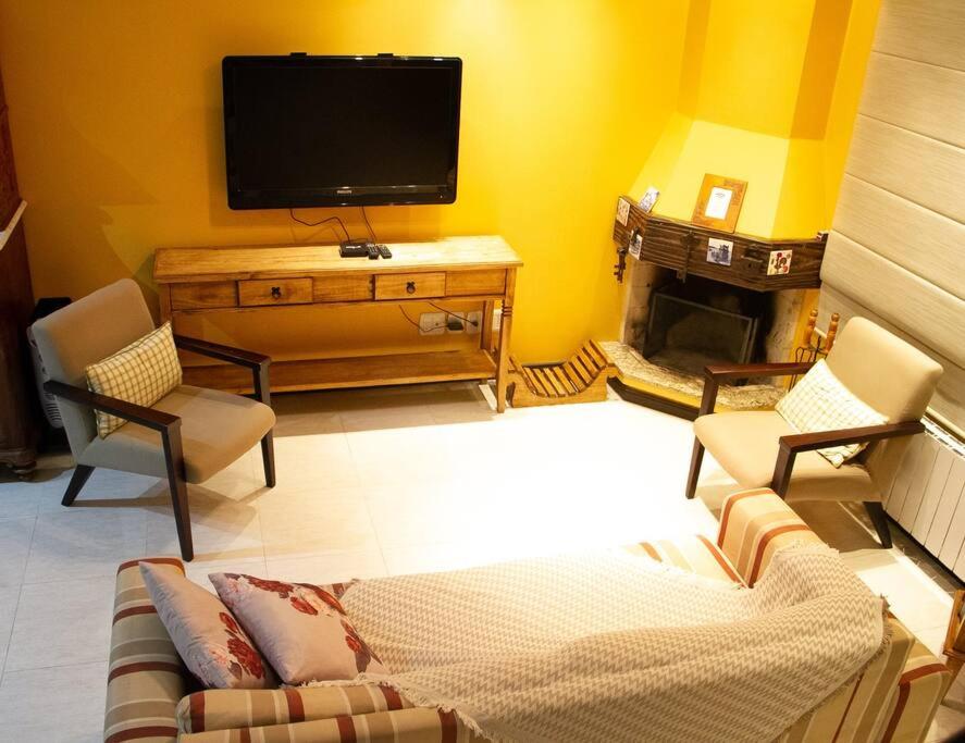 TV a/nebo společenská místnost v ubytování Casa Felice - Canela