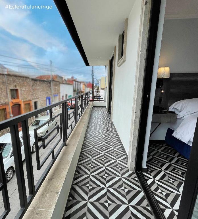 Postel nebo postele na pokoji v ubytování Hotel Esfera Tulancingo