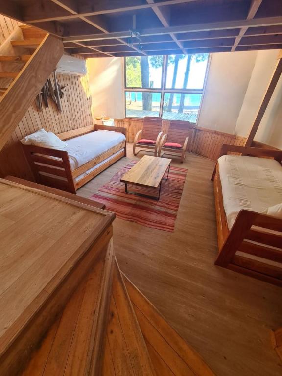 Cama ou camas em um quarto em Magma Lodge, Pucon
