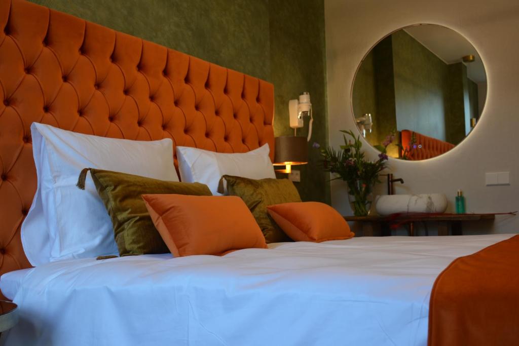 Postel nebo postele na pokoji v ubytování The IF Boutique hotel