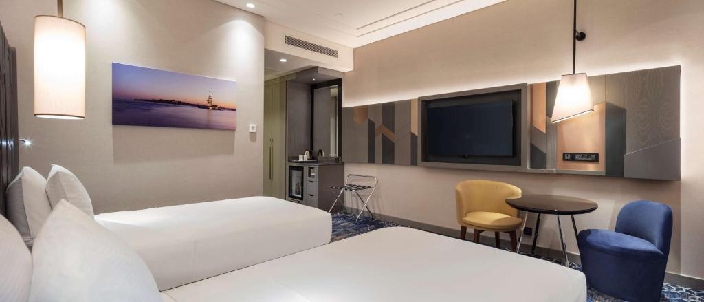 TV a/nebo společenská místnost v ubytování Hilton Istanbul Bakirkoy