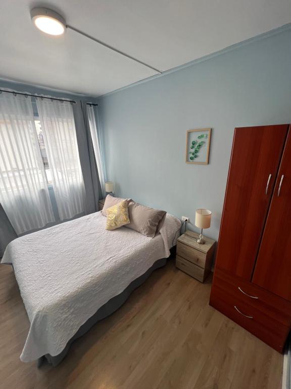 Postel nebo postele na pokoji v ubytování Hostal Ravello