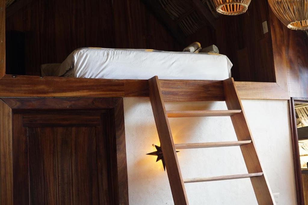 Postel nebo postele na pokoji v ubytování Casa playa del Amor