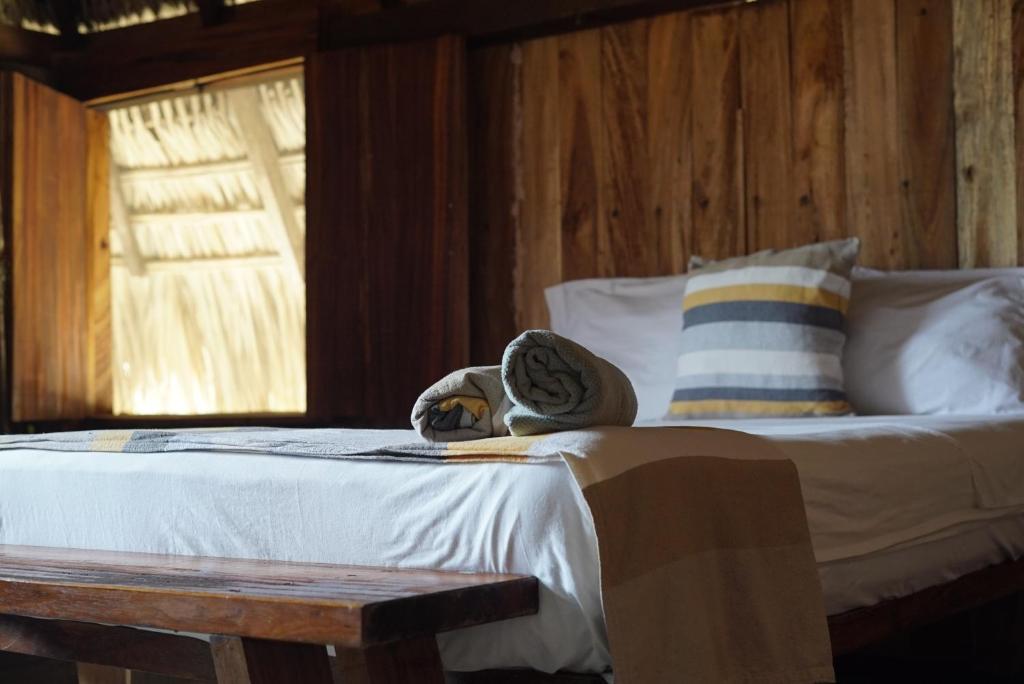 Postel nebo postele na pokoji v ubytování Casa playa del Amor