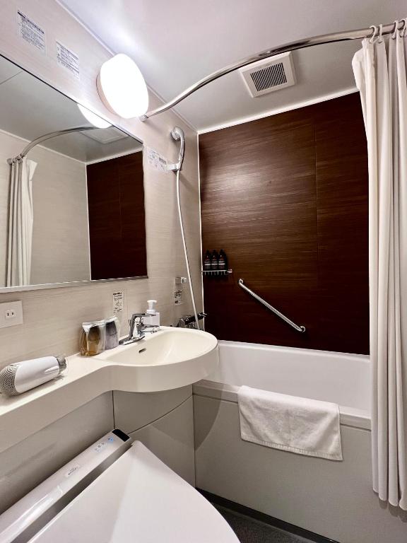 Koupelna v ubytování ABiz hotel