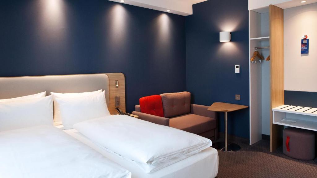 Postel nebo postele na pokoji v ubytování Holiday Inn Express - Saarbrücken by IHG