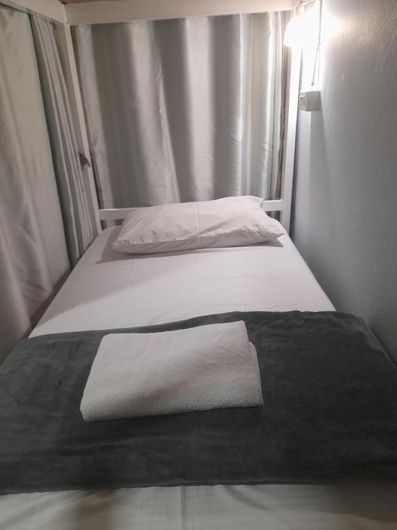 Postel nebo postele na pokoji v ubytování Hangover Hostel