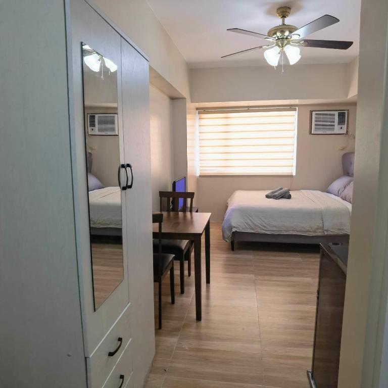Postel nebo postele na pokoji v ubytování Avida Davao by davaobnb & Lemonique Homes