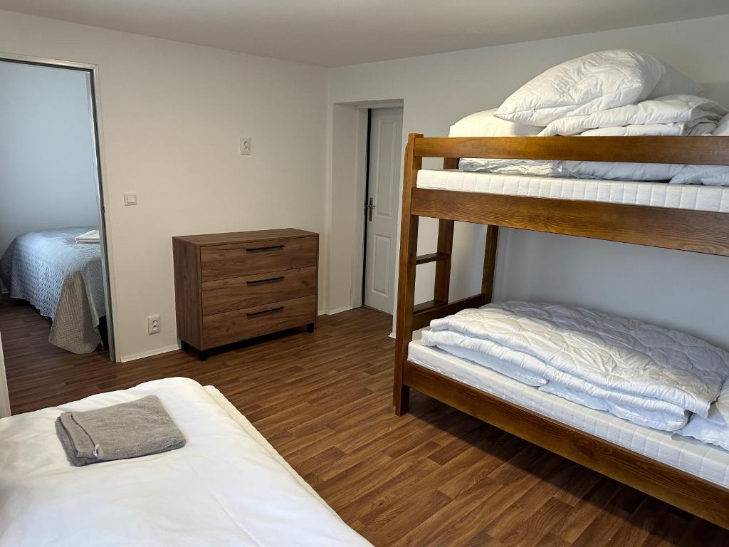 Postel nebo postele na pokoji v ubytování Vinařský dům Kovárna