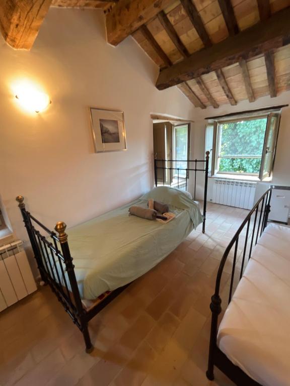 Postel nebo postele na pokoji v ubytování Casa Al Fondo