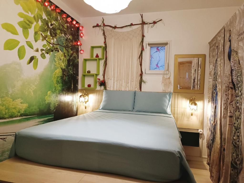 Кровать или кровати в номере L'oasis paisible