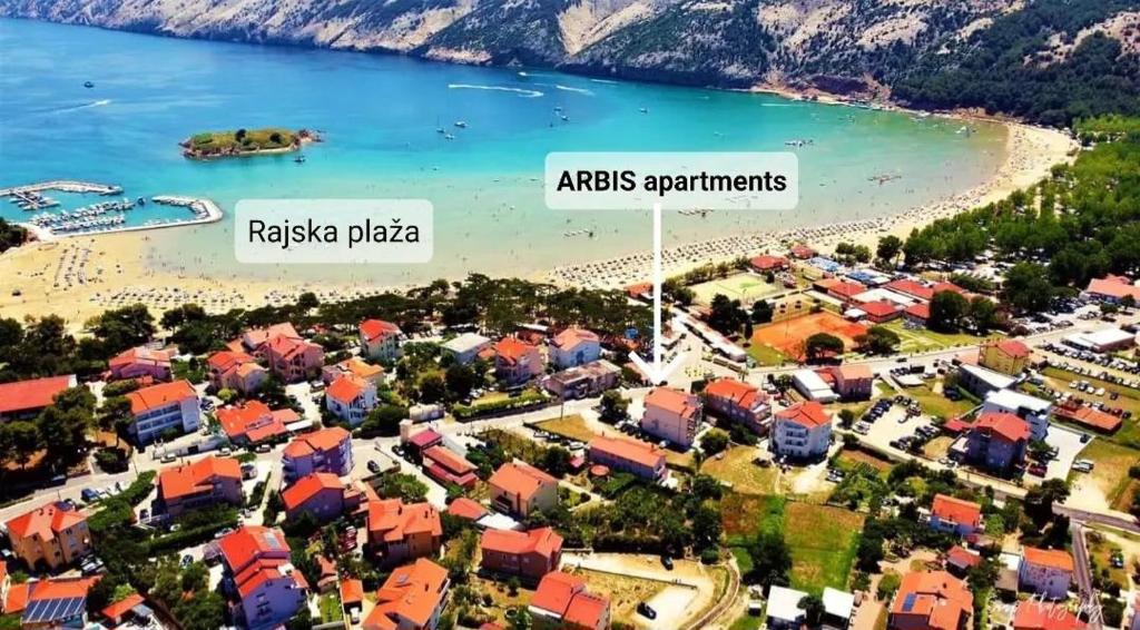 an aerial view of a resort and a beach at Apartments Arbis in Lopar