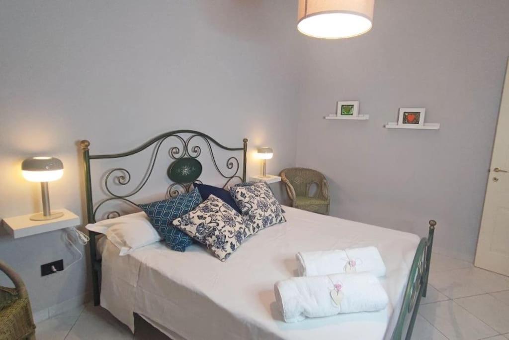 Postel nebo postele na pokoji v ubytování INN pieno centro- appartamento