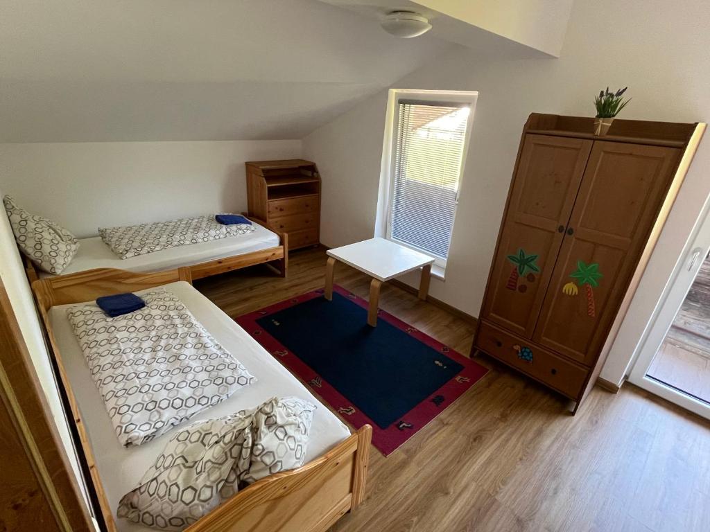 Postel nebo postele na pokoji v ubytování Loft Kammleitn