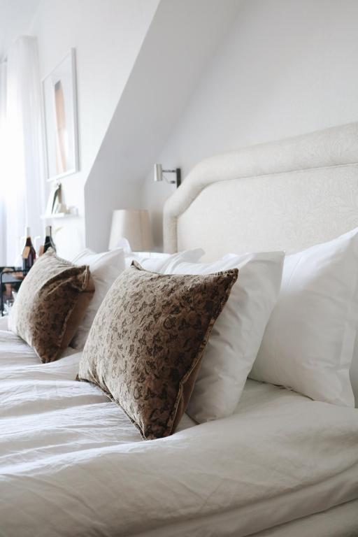 Postel nebo postele na pokoji v ubytování Kalk Hotel
