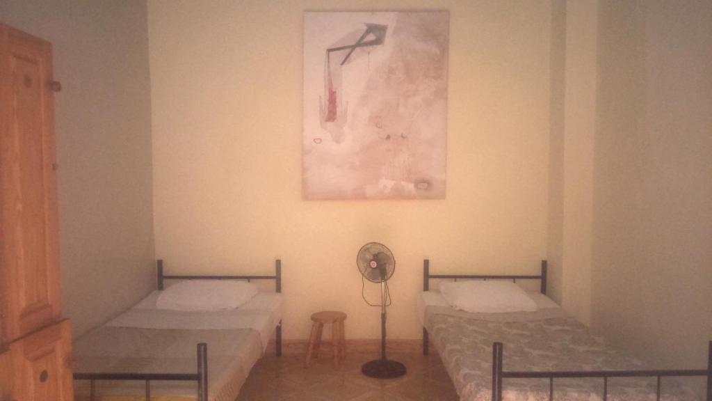Postel nebo postele na pokoji v ubytování La Choza Guesthouse