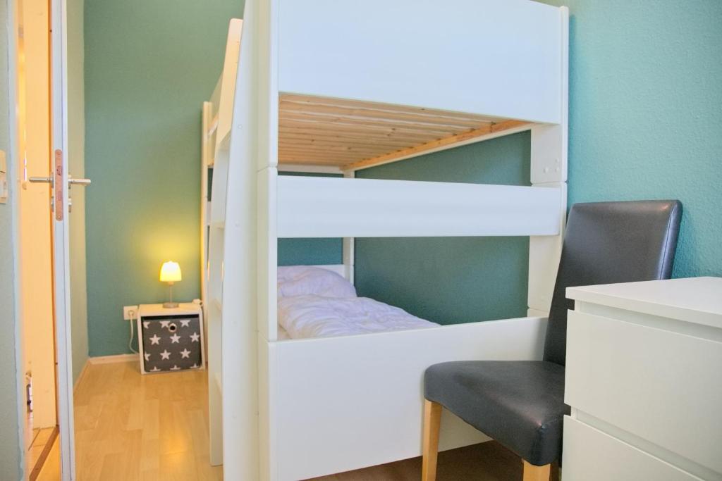 Postel nebo postele na pokoji v ubytování Grömitz- Center II App 04 inkl WLAN