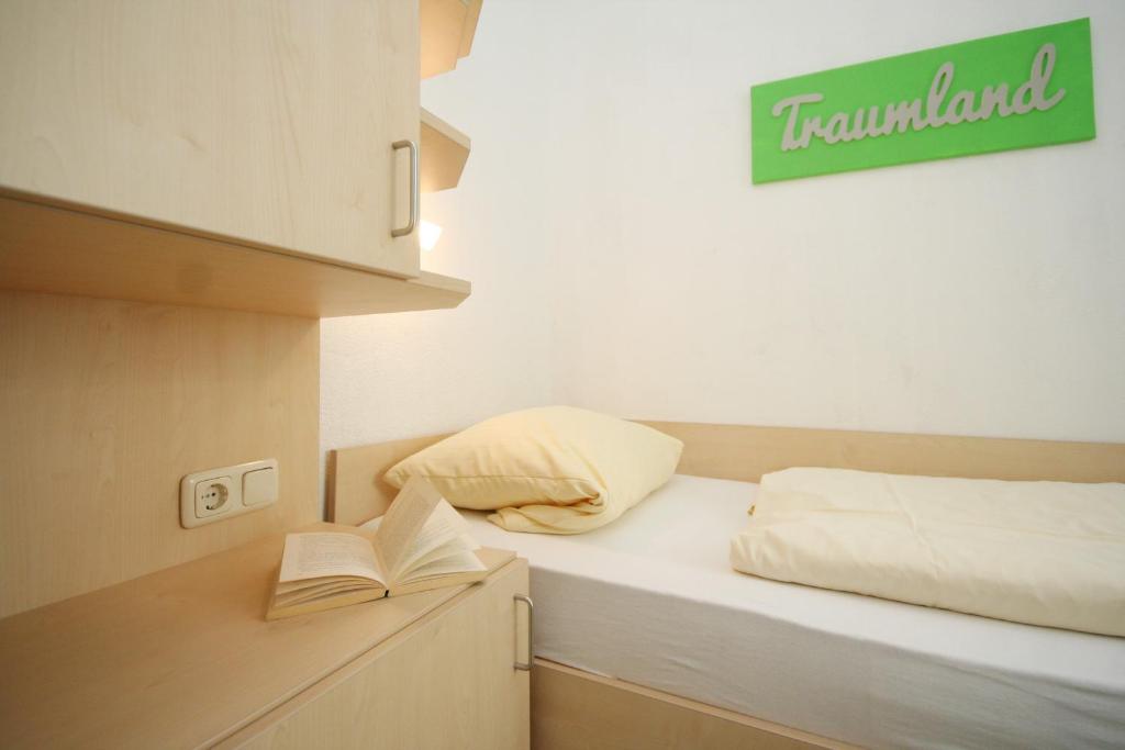 Postel nebo postele na pokoji v ubytování Miramar App 705 inkl WLAN
