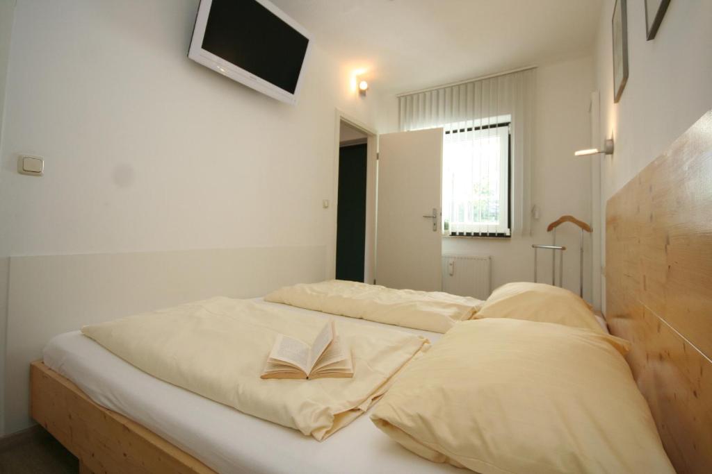 Postel nebo postele na pokoji v ubytování Miramar App 705 inkl WLAN