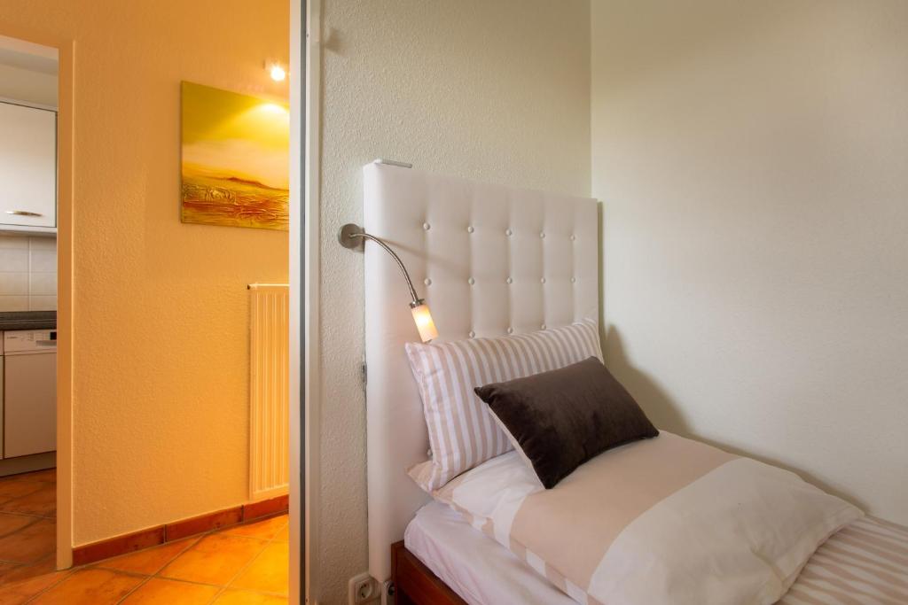 Postel nebo postele na pokoji v ubytování Miramar App 503 Inkl WLAN
