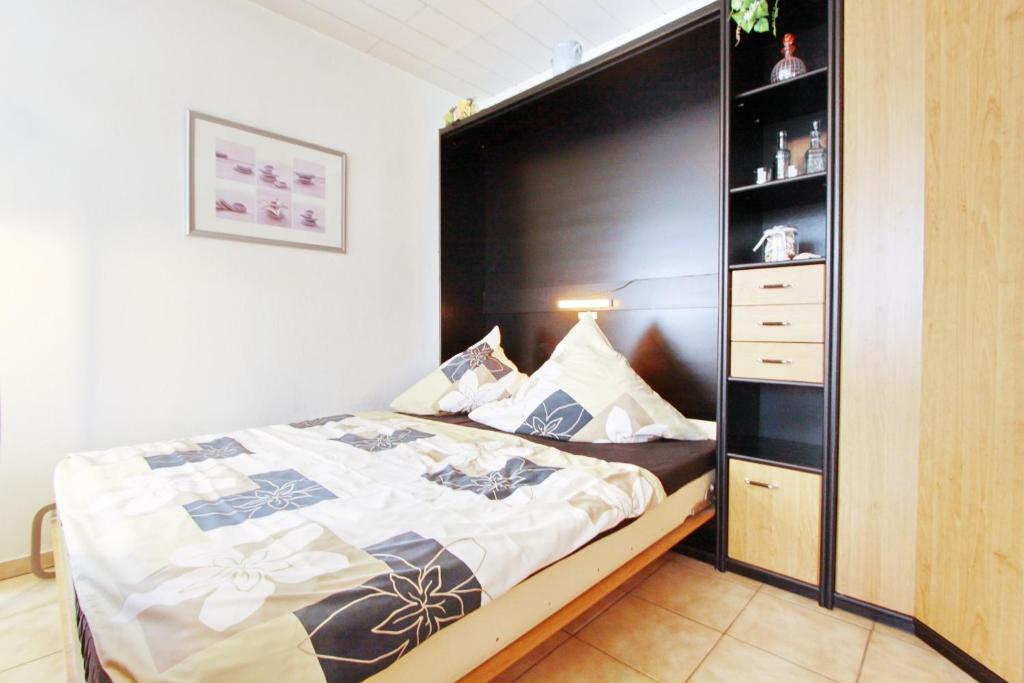 Postel nebo postele na pokoji v ubytování Villa am Meer App 18
