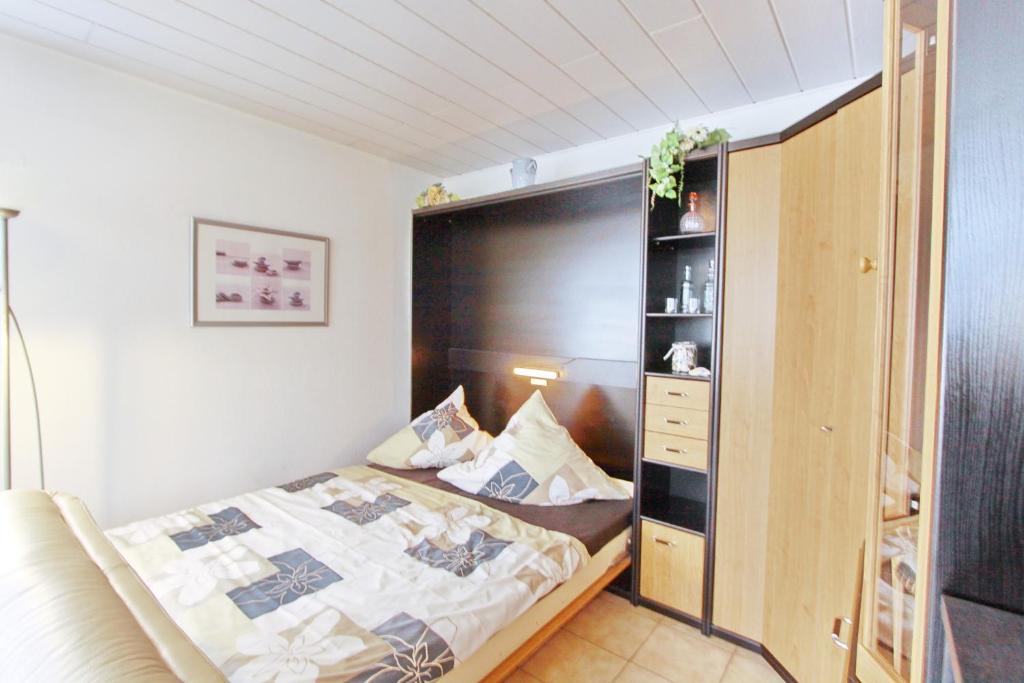 Postel nebo postele na pokoji v ubytování Villa am Meer App 18