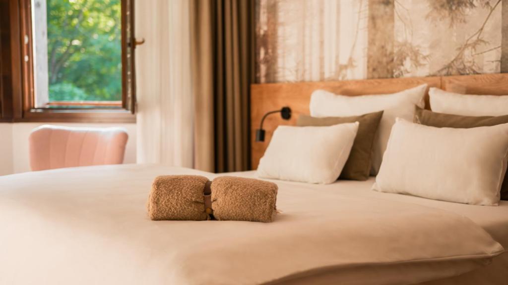 Postel nebo postele na pokoji v ubytování Hotel Soyka