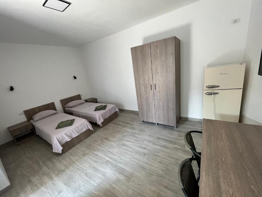 Postel nebo postele na pokoji v ubytování Vila Nei