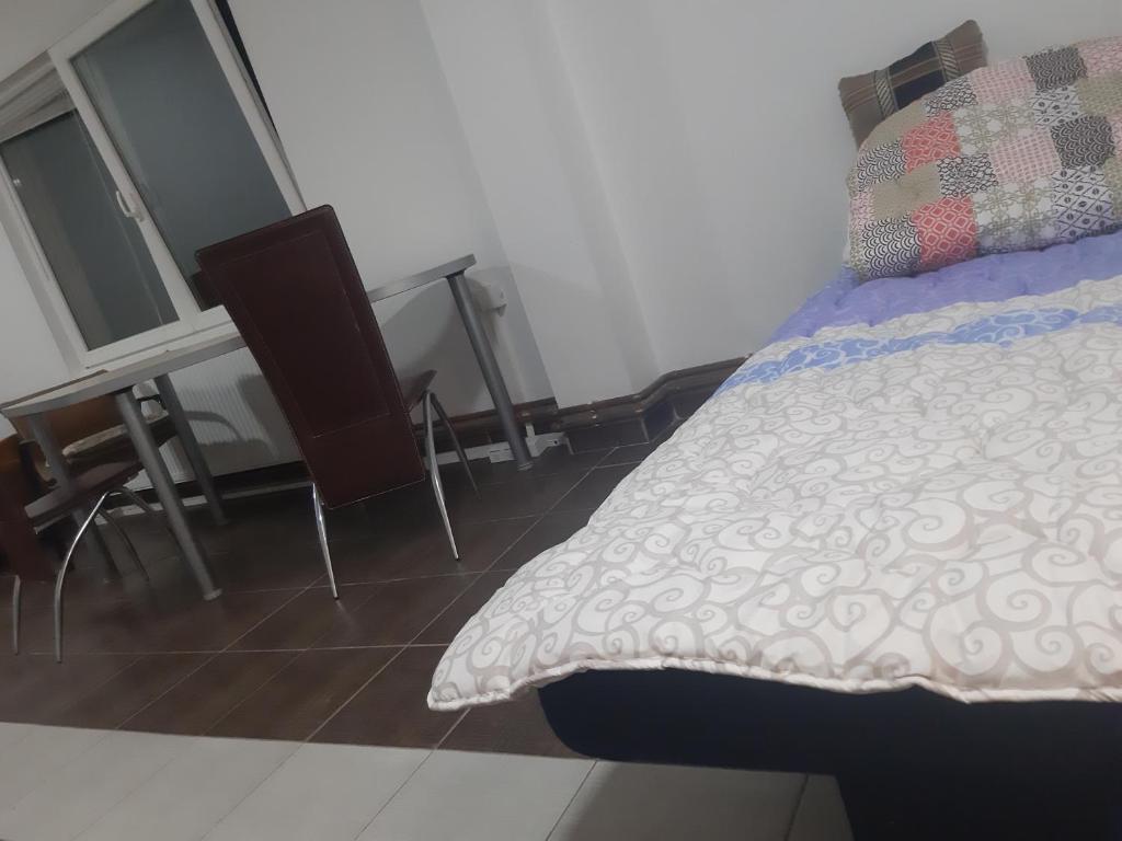 En eller flere senge i et v&aelig;relse p&aring; Prostrani apartman Cacak