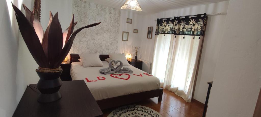 Postel nebo postele na pokoji v ubytování Chambre d'hôte Amouratcha