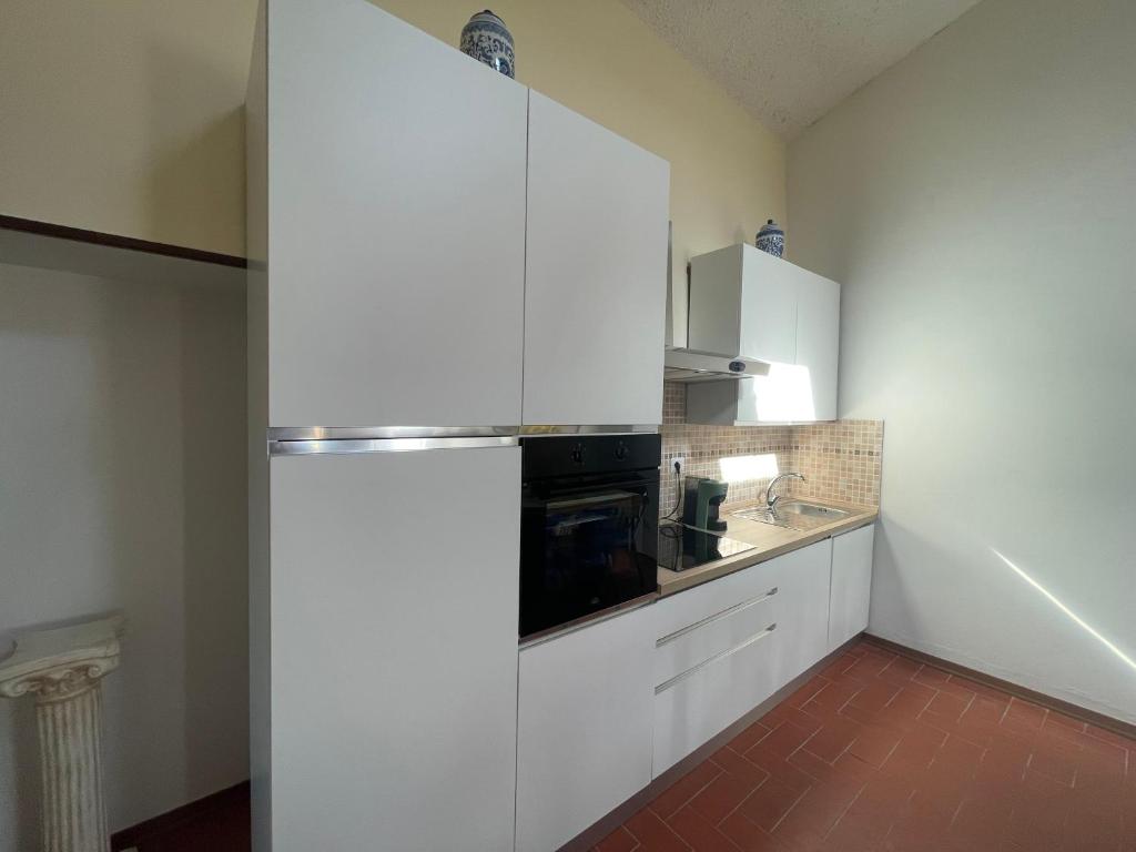 Kuchyň nebo kuchyňský kout v ubytování AGRITURISMO LA MOROLLA