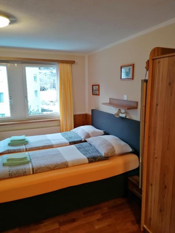 Postel nebo postele na pokoji v ubytování Hotel Stille