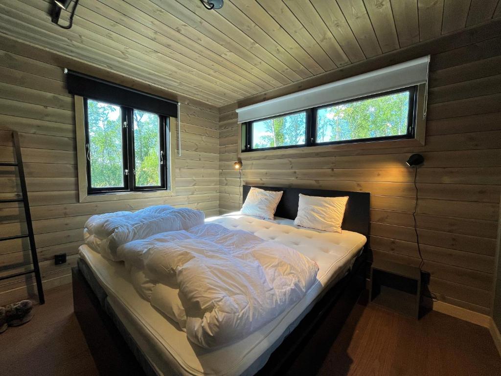 Postel nebo postele na pokoji v ubytování Skarvruet Lodge Funäsdalen