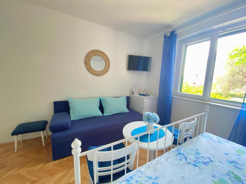 Postel nebo postele na pokoji v ubytování Apartmani Marko