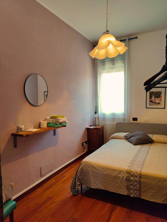 A bed or beds in a room at B&B Colorado