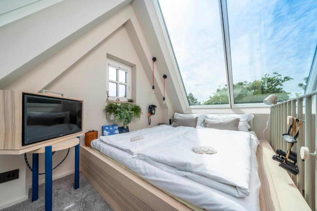 Postel nebo postele na pokoji v ubytování Apart Hotel Wasserturm