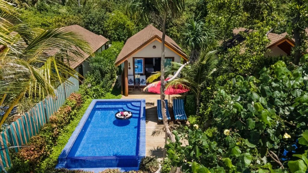 Zahrada ubytování Reethi Faru Resort - Stay 5 Nights or more Between Aug-Sept 2025 & Enjoy a Free Sunset Cruise