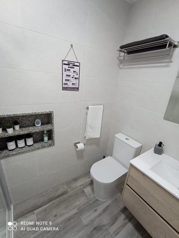 Koupelna v ubytování APARTAMENTOS LA CAPILLA