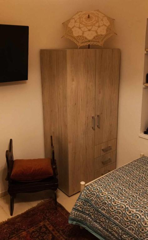 Postel nebo postele na pokoji v ubytování CORALLI