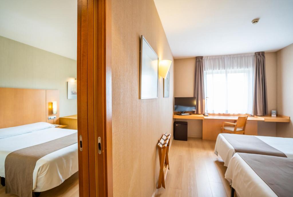 Postel nebo postele na pokoji v ubytování Posadas De España Paterna